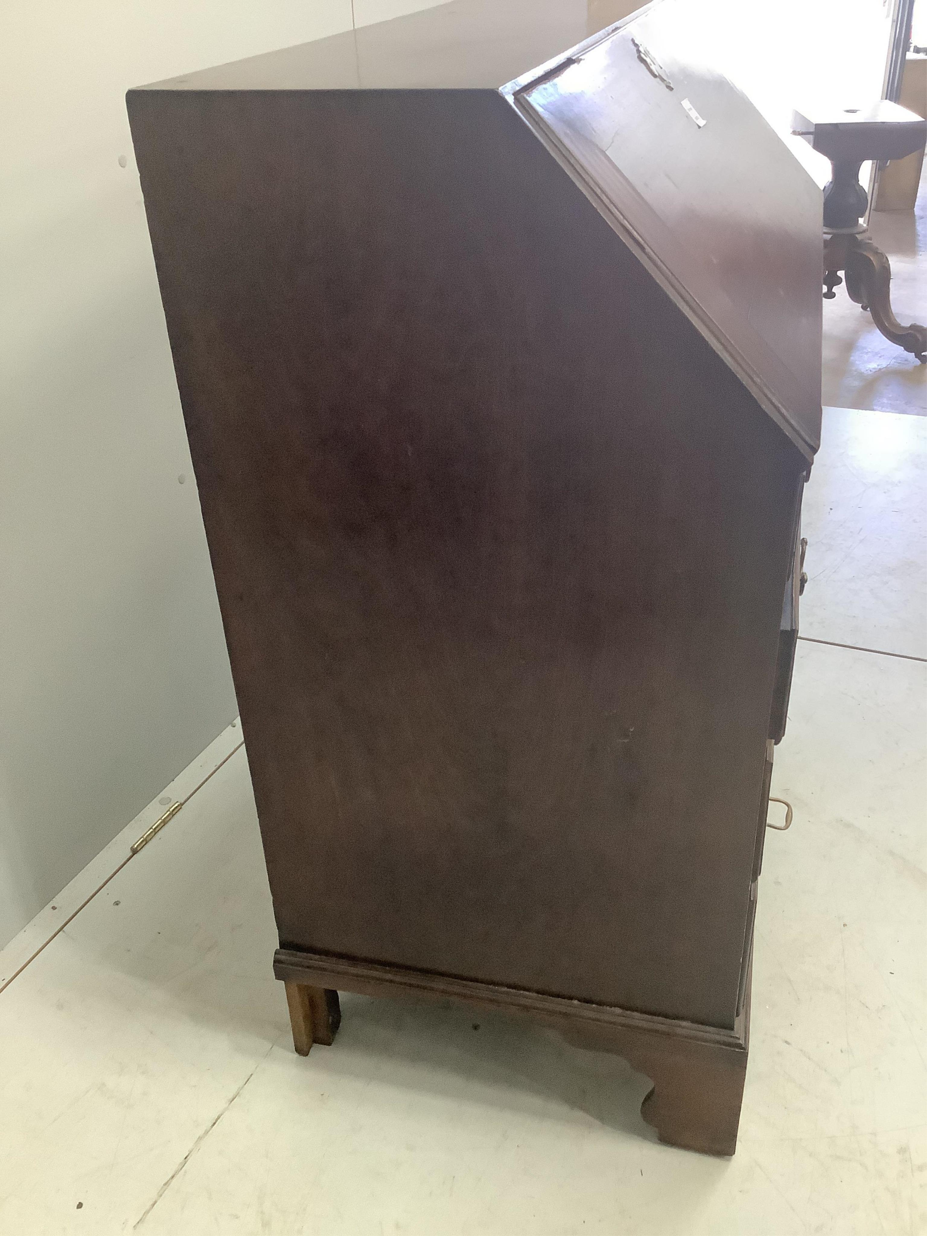 A George III mahogany bureau, width 91cm, depth 52cm, height 105cm. Condition - poor